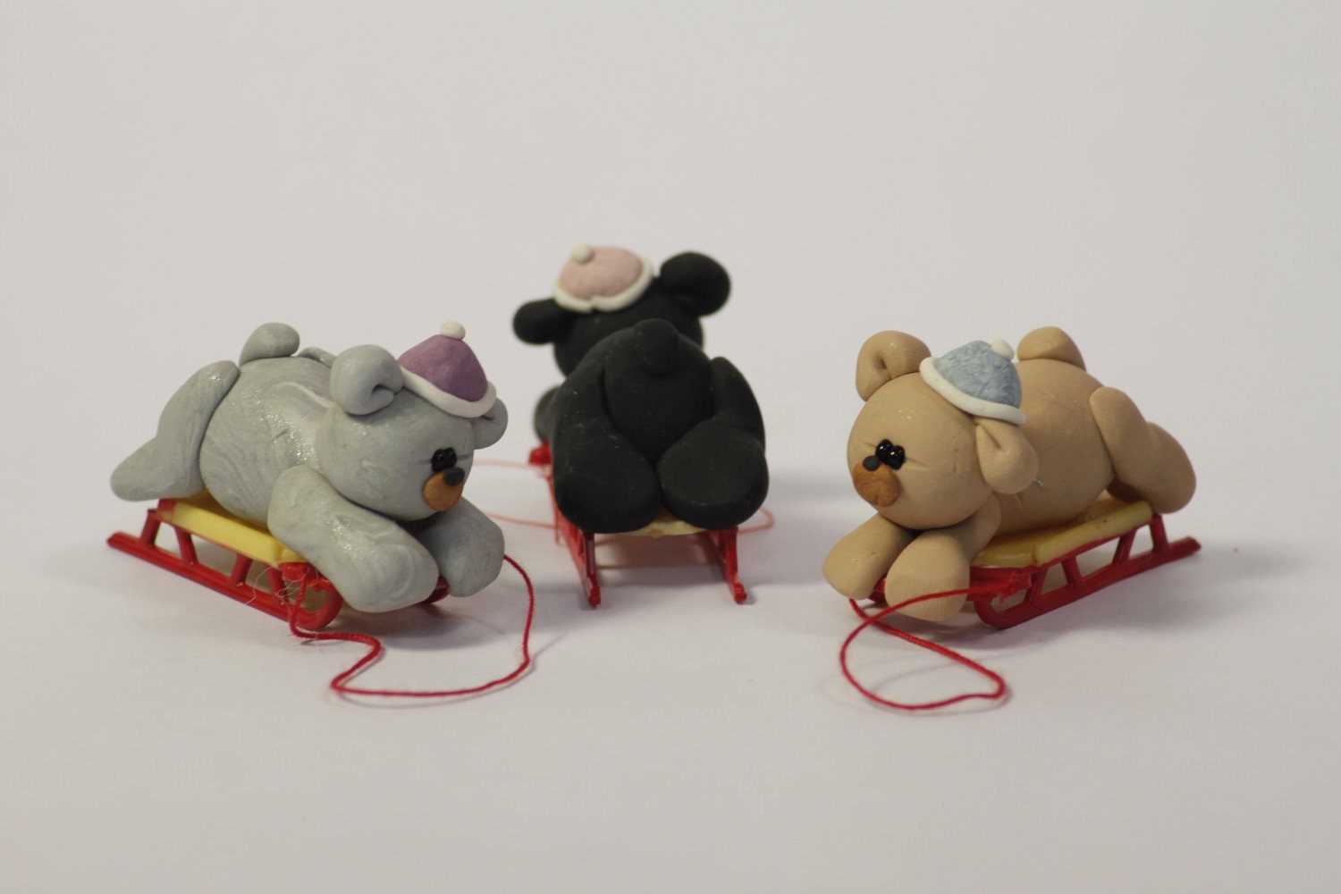 Miniature Clay Sled Bear Sculptures