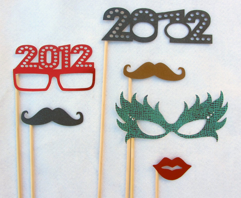 New Years 2012 Party Kit. Perfect for photo booth pictures, new years and parties. Ships 2-3 Day Priority Mail