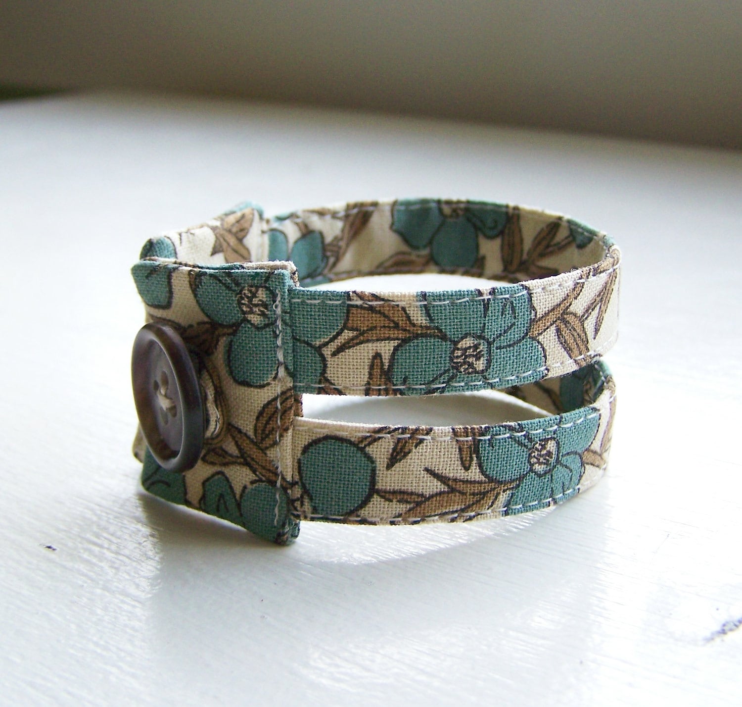 Fabric cuff bracelet in boho blooms beige blue floral
