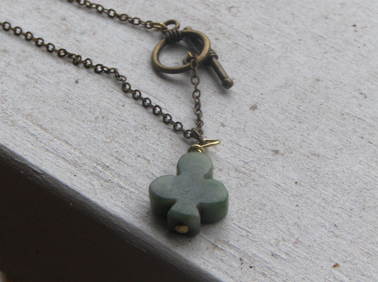 As Luck would have it.  Green Jade 3 leaf lucky Irish Clover Unisex necklace.