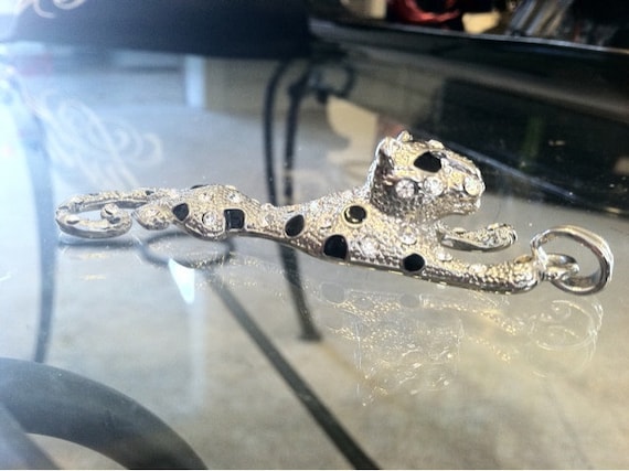 Beautiful Jaguar silver pendant with rhinestones and black spots