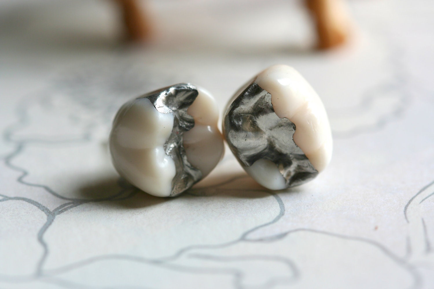 Amalgam tooth earrings, dental oddity
