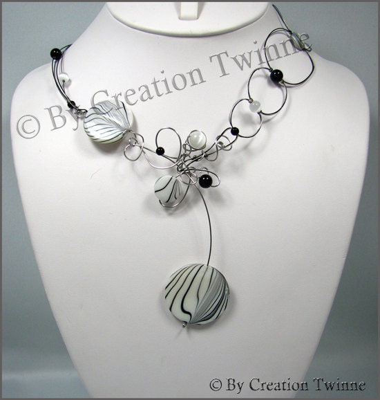 white and black stripe sea shell necklace onyx aate swirls 