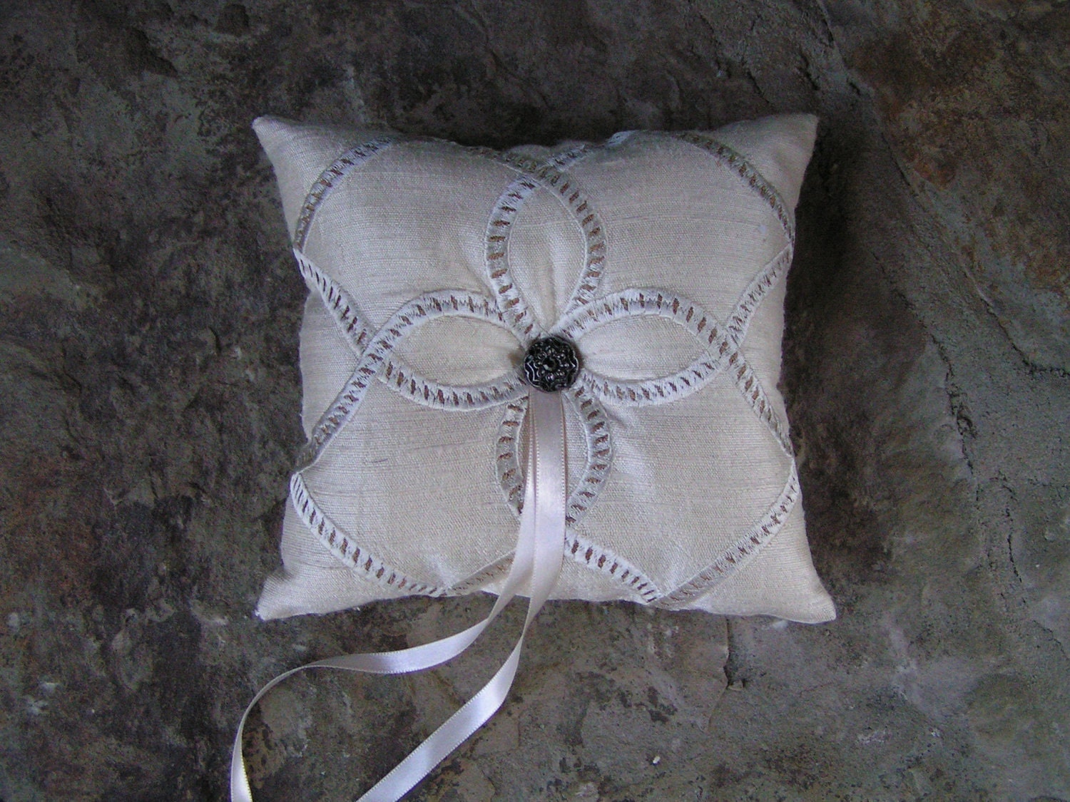 Luxurious dupioni silk ring bearer pillow wrapped in a feather boa in 