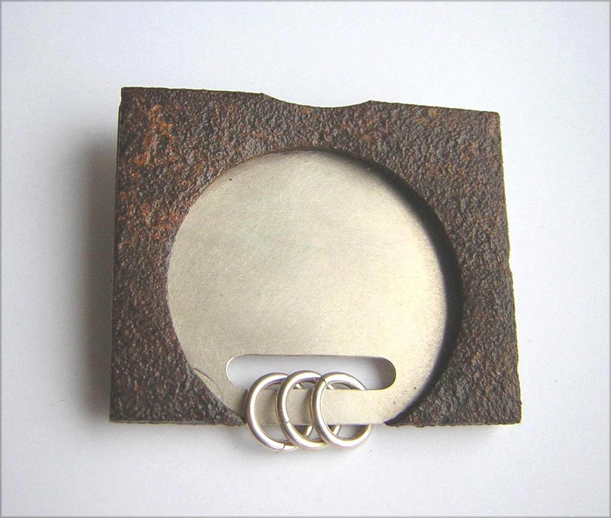 Rusty Relics silver brooch with found rusty object