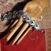Silver CORO Pegasus U. S. patent pending link bracelet with fold over clasp and safety chain