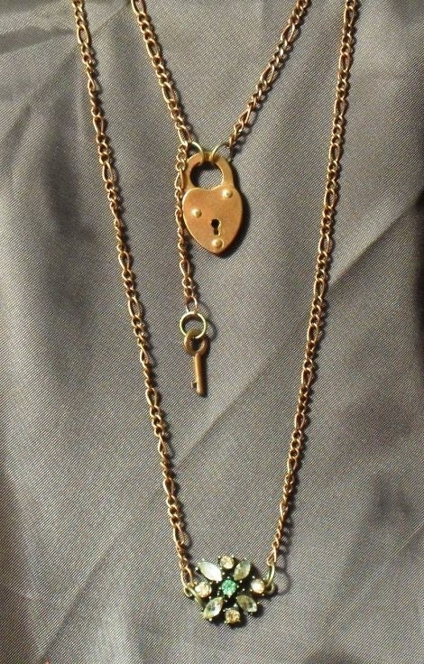 Handmade Bronze peach and green glass locket with heart lock clasp and key dangle