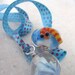 Handmade Glass Bookworm Bookmark in blue hues