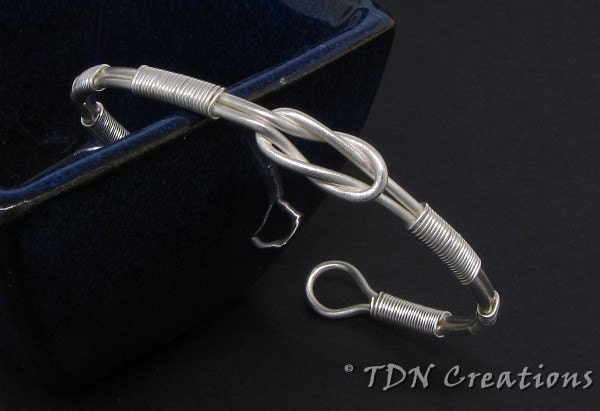 Love knot sterling silver open bangle
