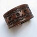 Wide Brown Tooled Leather Wristband - Segments