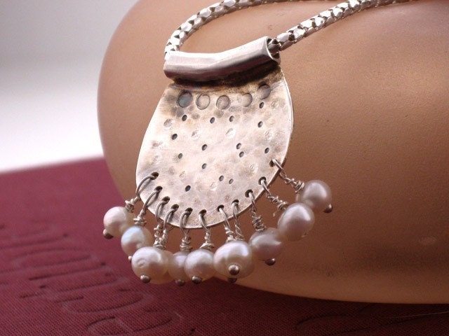 Freshwater pearl necklace with unusual handmade silver pendant