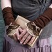 Miss Eyre - crocheted open work lacy wrist warmers cuffs