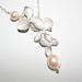 Orchid Flower Necklace  Freshwater Pearl Blooming by smilesophie from etsy.com