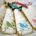 Velvet Songbird Tags music sheet sage sepia pink aqua birds hand stamped