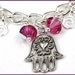 Silver Charm Bracelet With an Array of Pewter by anjalicreations Silver Charm Bracelet With an Array of Pewter by anjalicreations