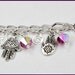 Silver Charm Bracelet With an Array of Pewter by anjalicreations