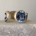 Open silver ring with blue cubic zircon - hammered sterling silver jewelry