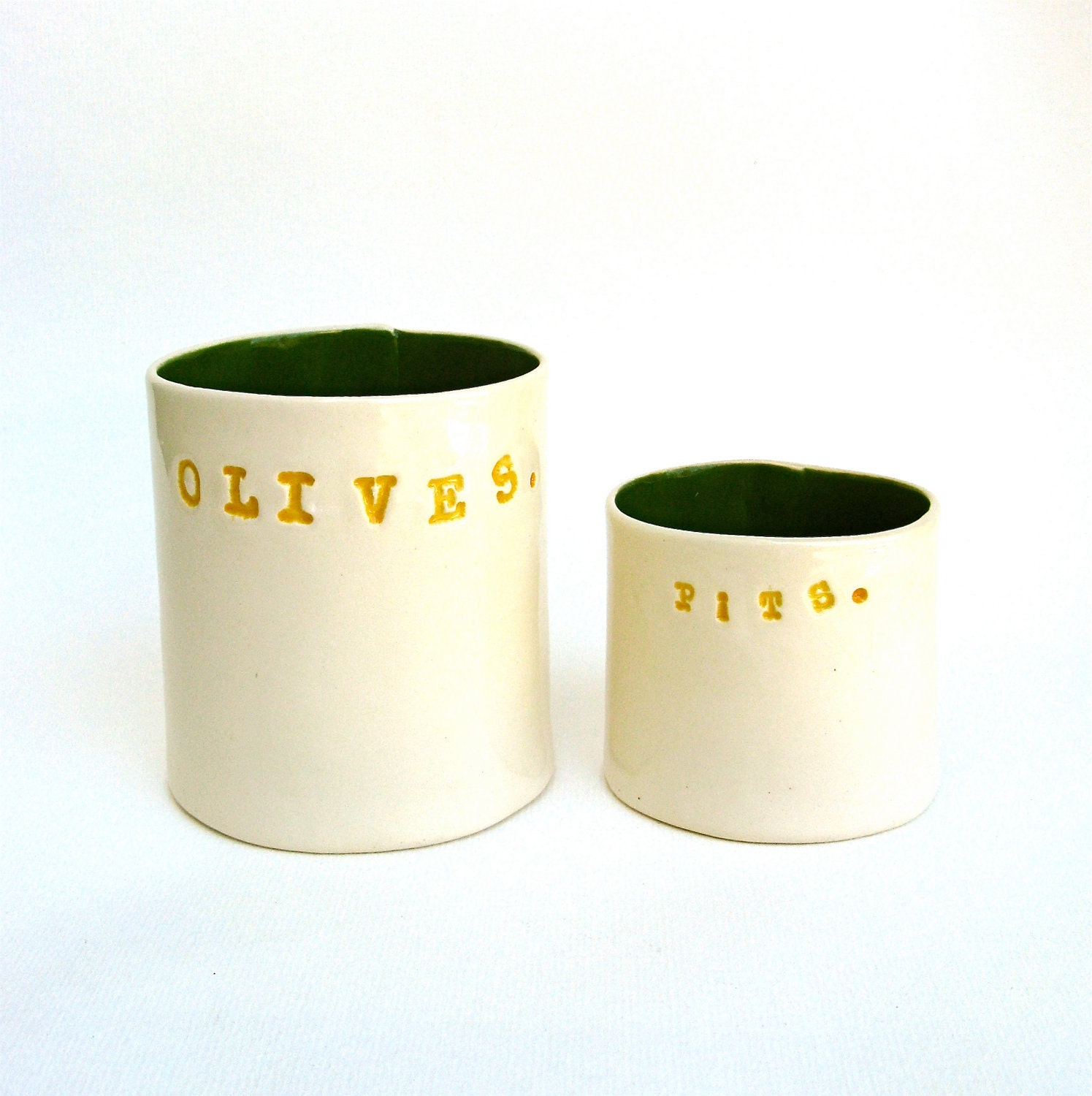 olives and pits  ....  hand built porcelain containers ...  vessels