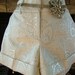 Vintage Hot pants Silver brocade cuffed hem shorts with attitude