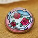 English Rose Teapot Glass Brooch - Round bronze brooch with flowers and polka dots