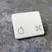Recycled Apple Command Key Pin