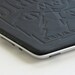 Embossed leather "Electric Library" smart cover for iPad 2 (Black)
