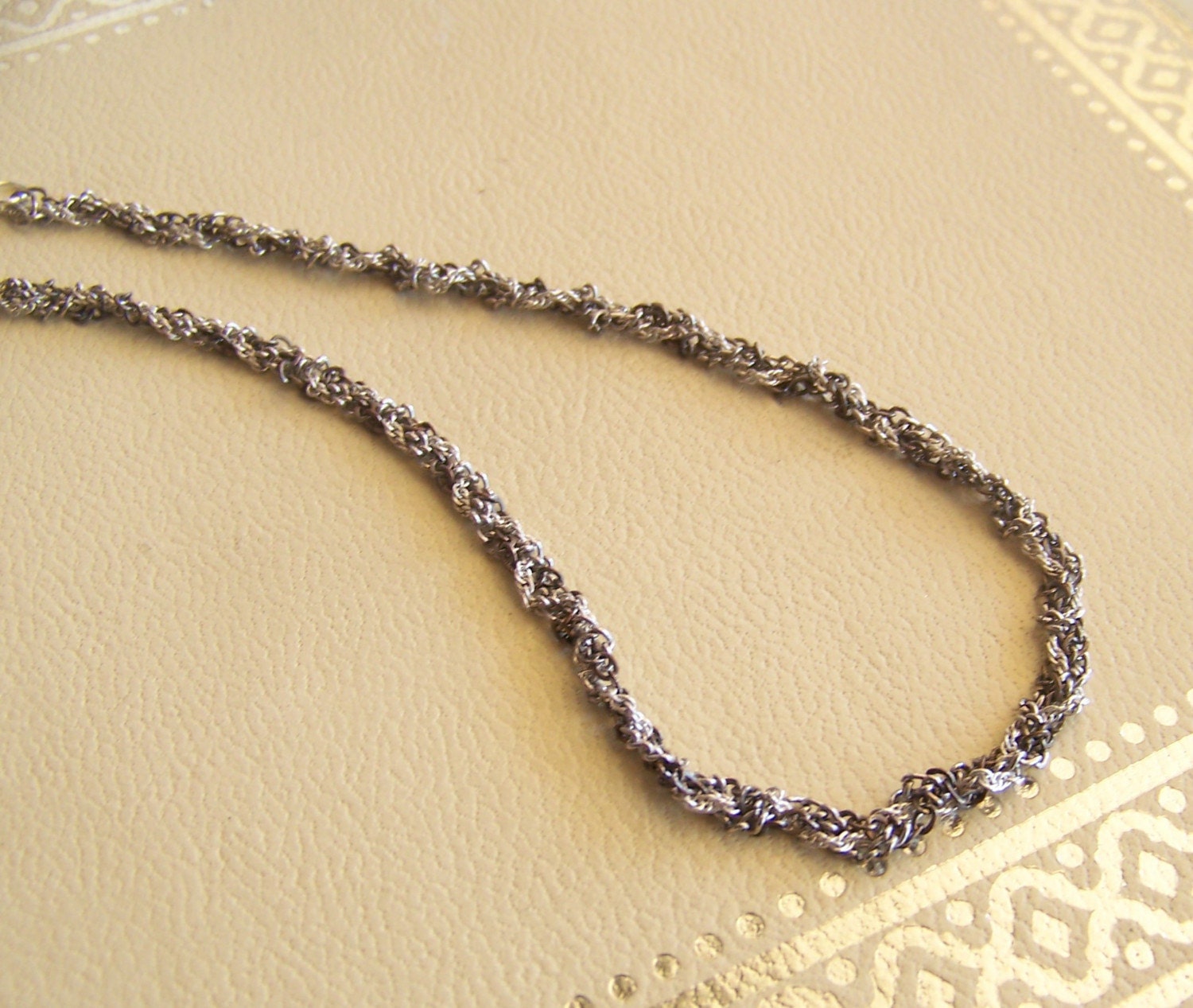 plait in silver - a necklace of vintage and recycled jewelry