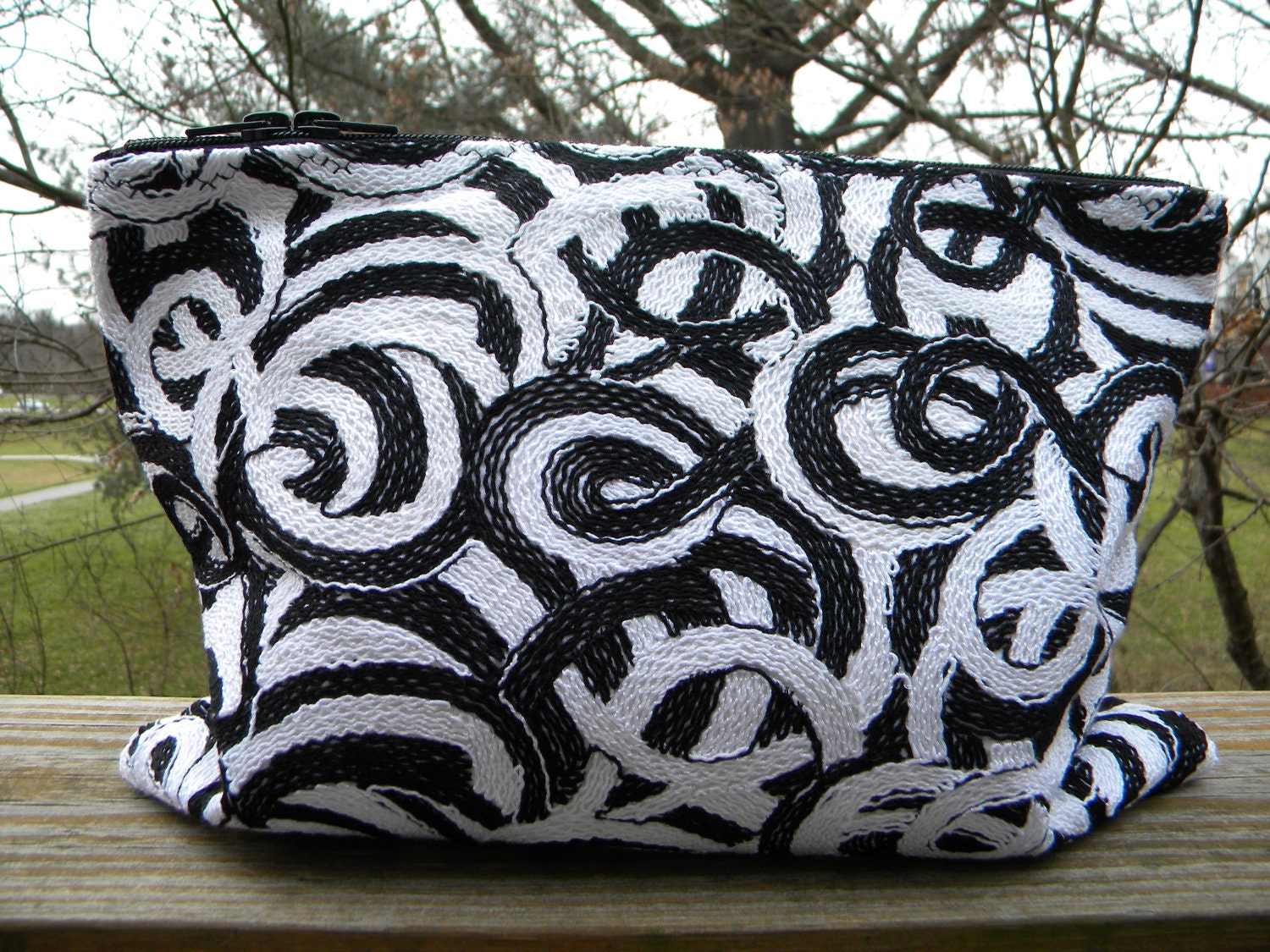 Graphic Swirls Statement Clutch