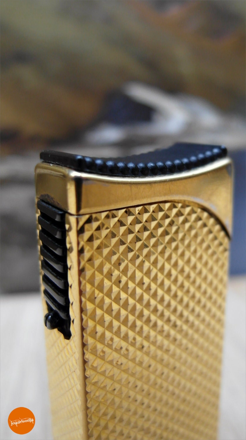 Gold seventies Rowenta cigarette lighter