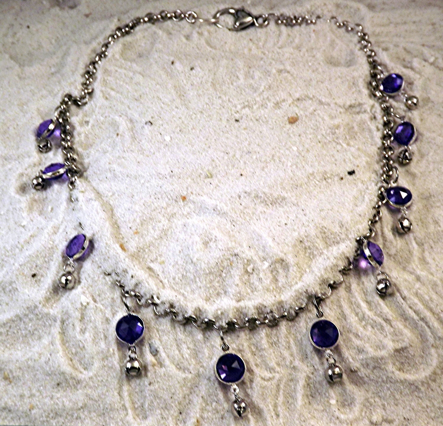 Amethyst colored silver choker with silver bells
