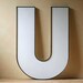 large vintage white letter U