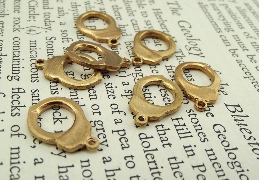 Vintage brass handcuff charms