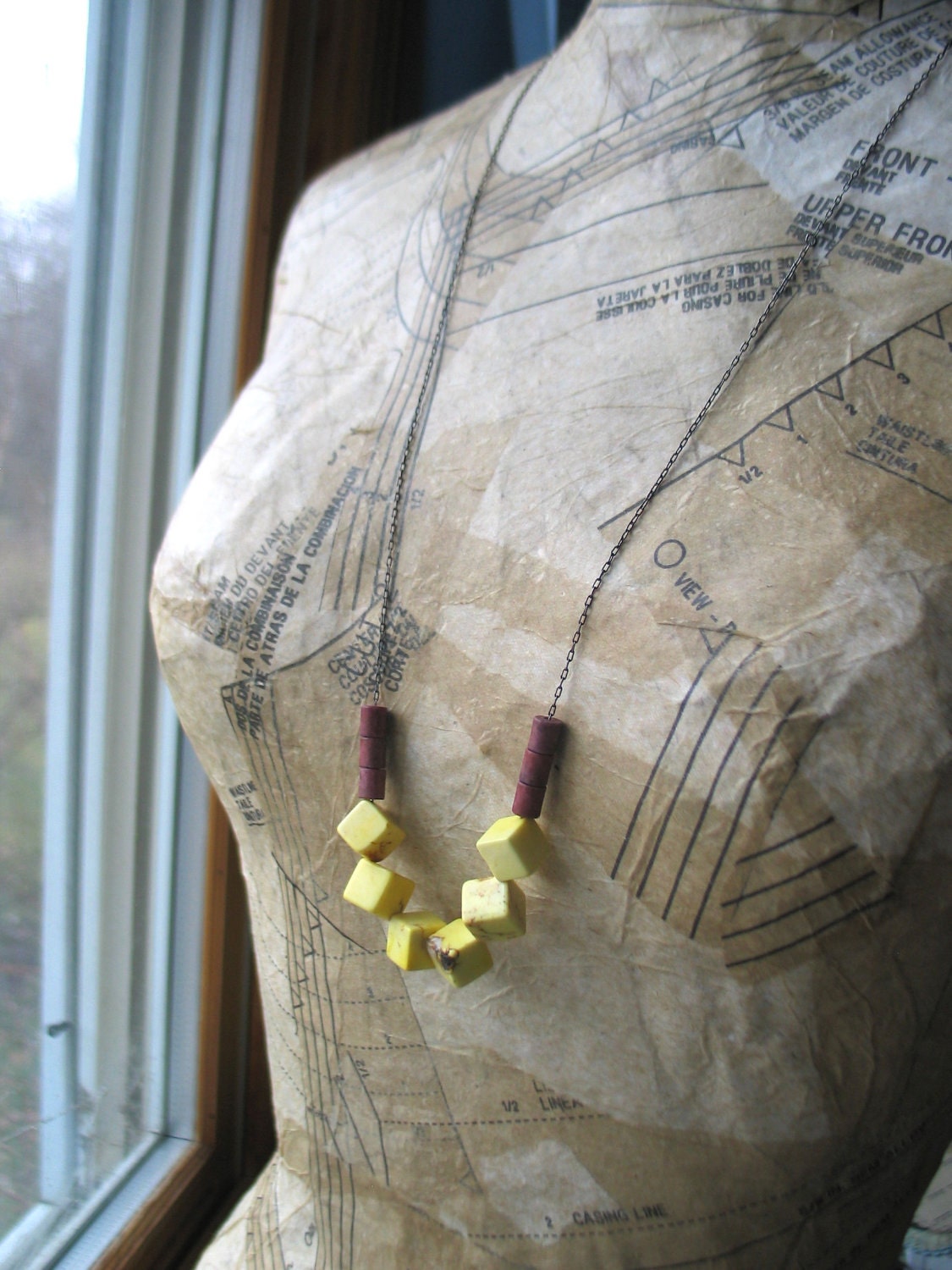yellow and cranberry geo beaded magnesite necklace