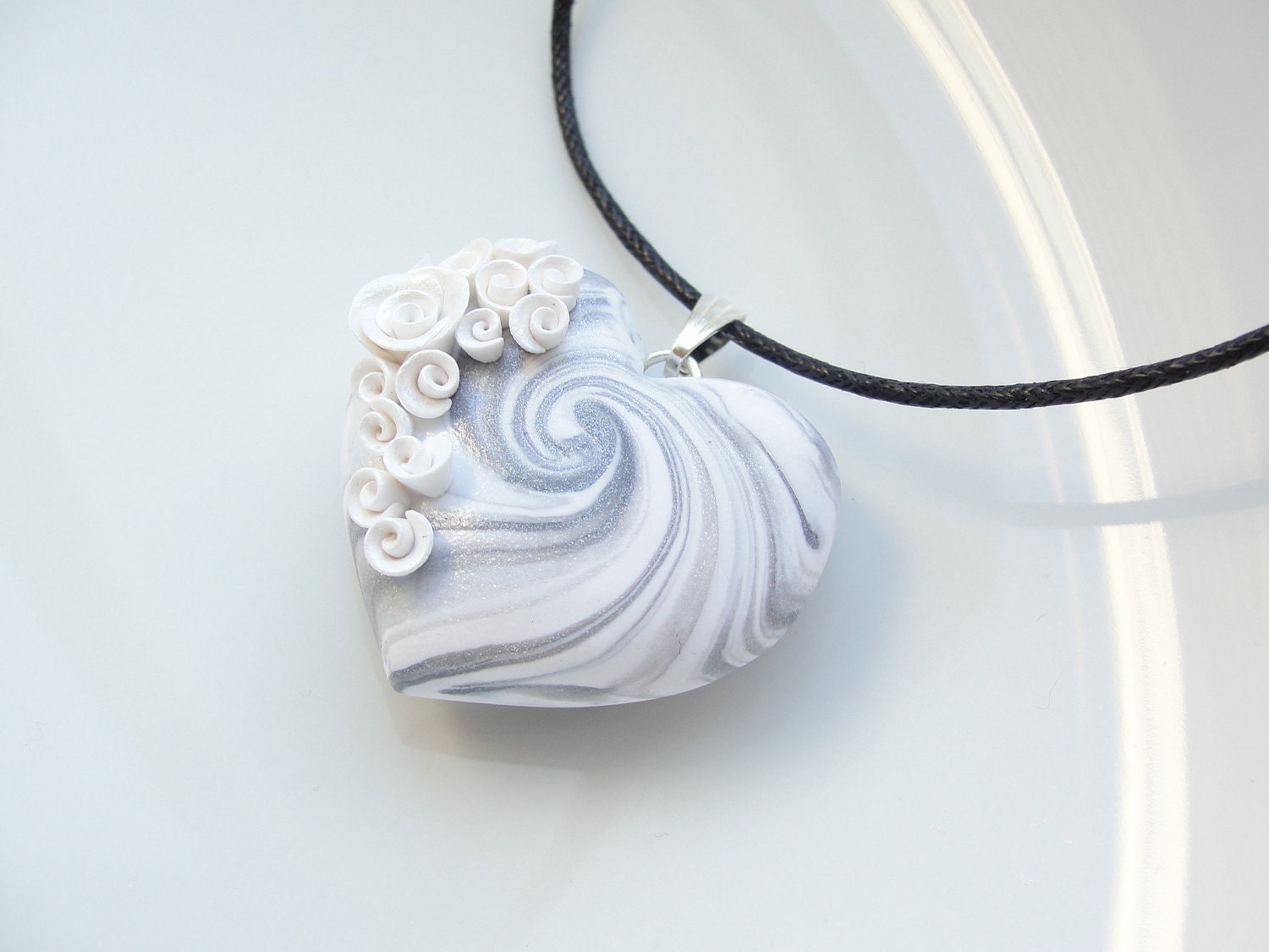 Heart pendant in white and silver with white roses on black cotton cord necklace