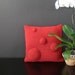 touch... this felted merinowool cushion/red