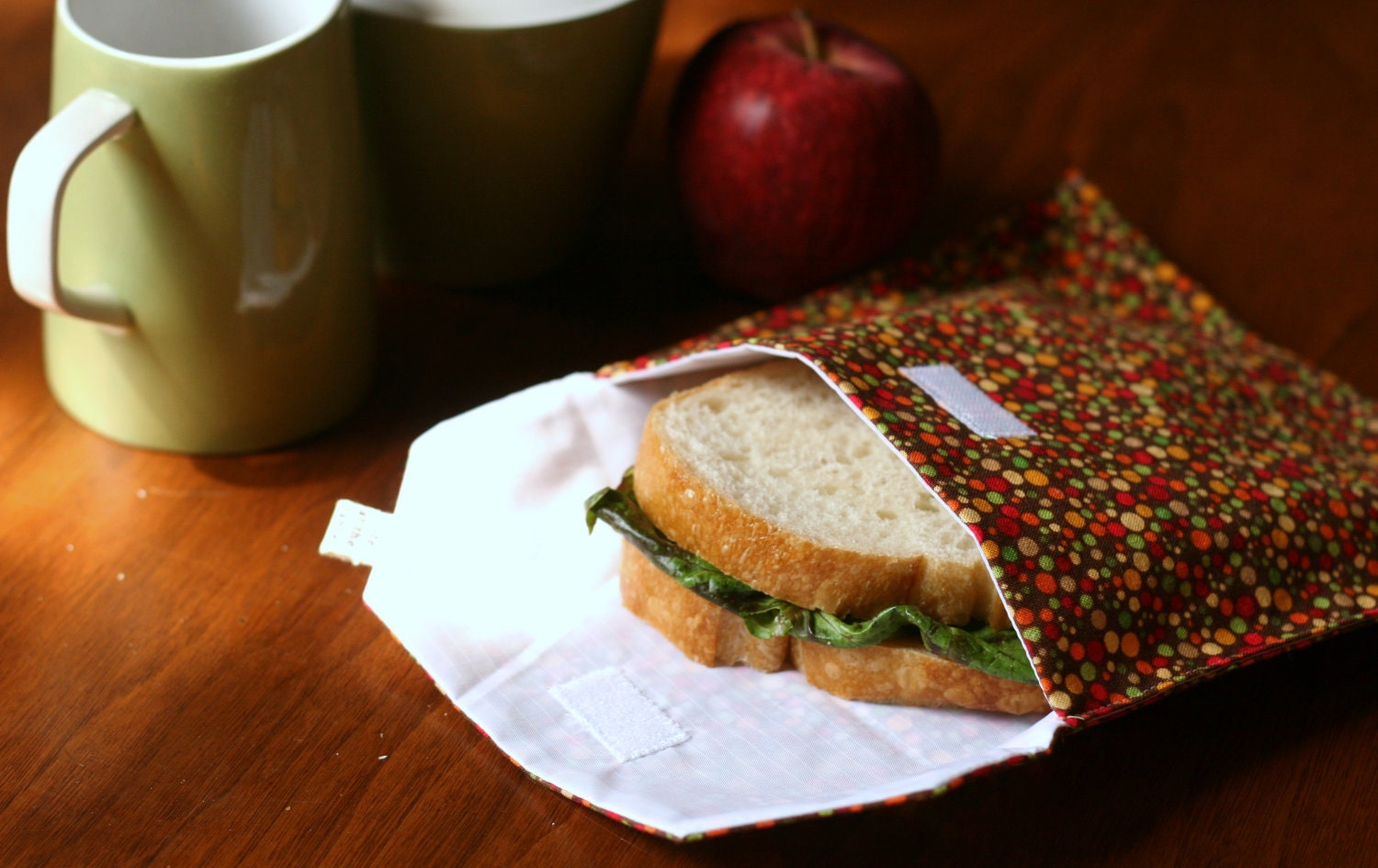 pair of reusable, lined sandwich bags in dinosaur & dots