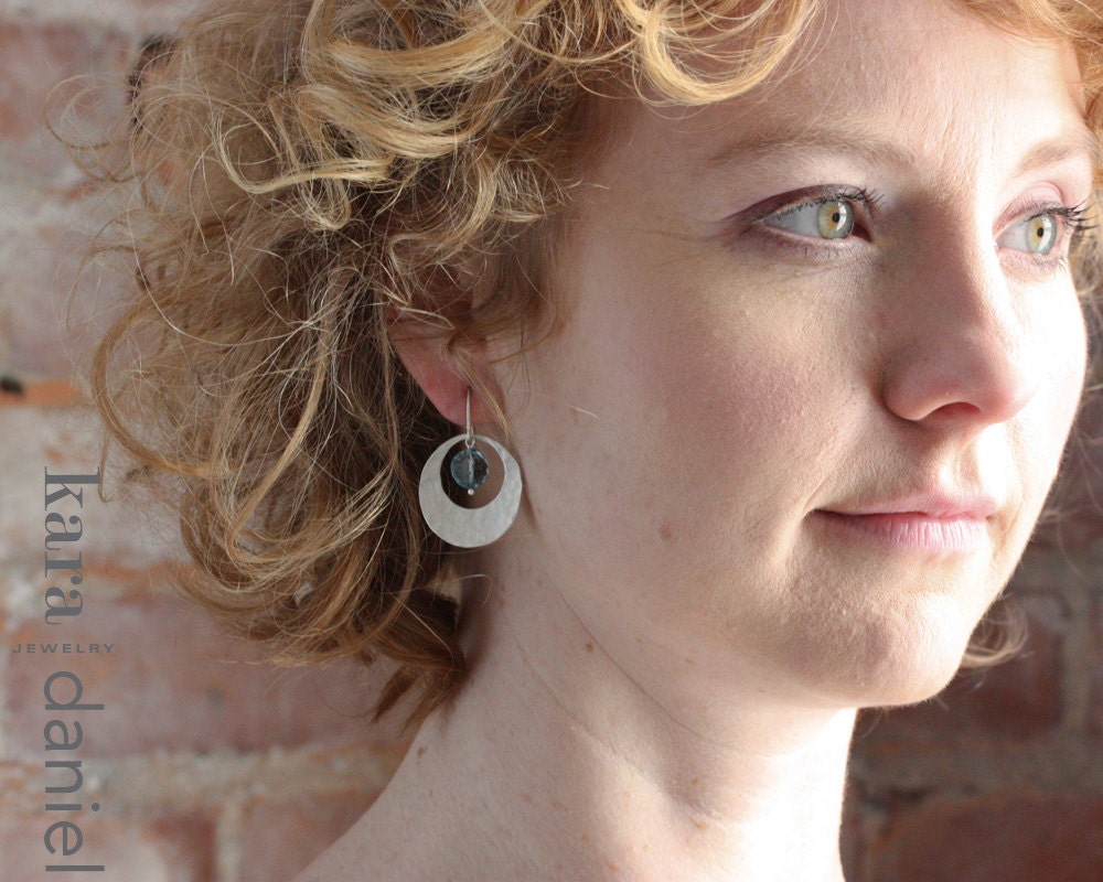 london blue topaz encircled in hammered sterling . earrings