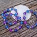 Beautiful Eye Catching Bracelet, blue and pink cracked ice beads seperated with antique silver swan beads