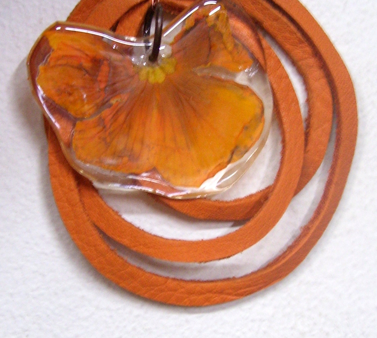 Necklace of true spring primrose, resin and leather