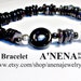 Mens Bracelet   "Prestige " focal point of Black Resin with a lBlack Pearl in the center,  Seashell, Hematite, Paua,Seed beads And Silver