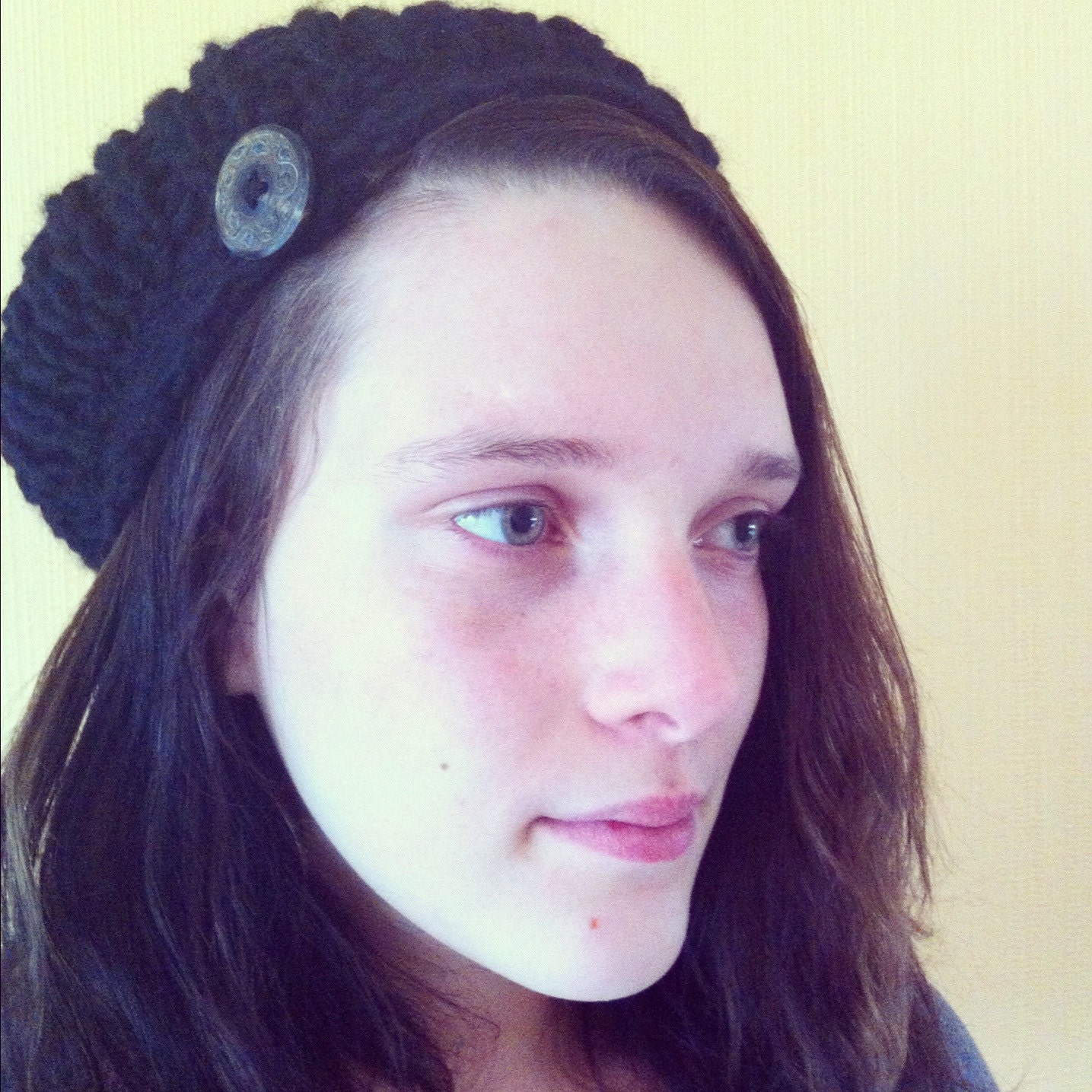 black wool beret with button