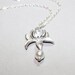 Silver Lily Necklace by smilesophie on Etsy from etsy.com