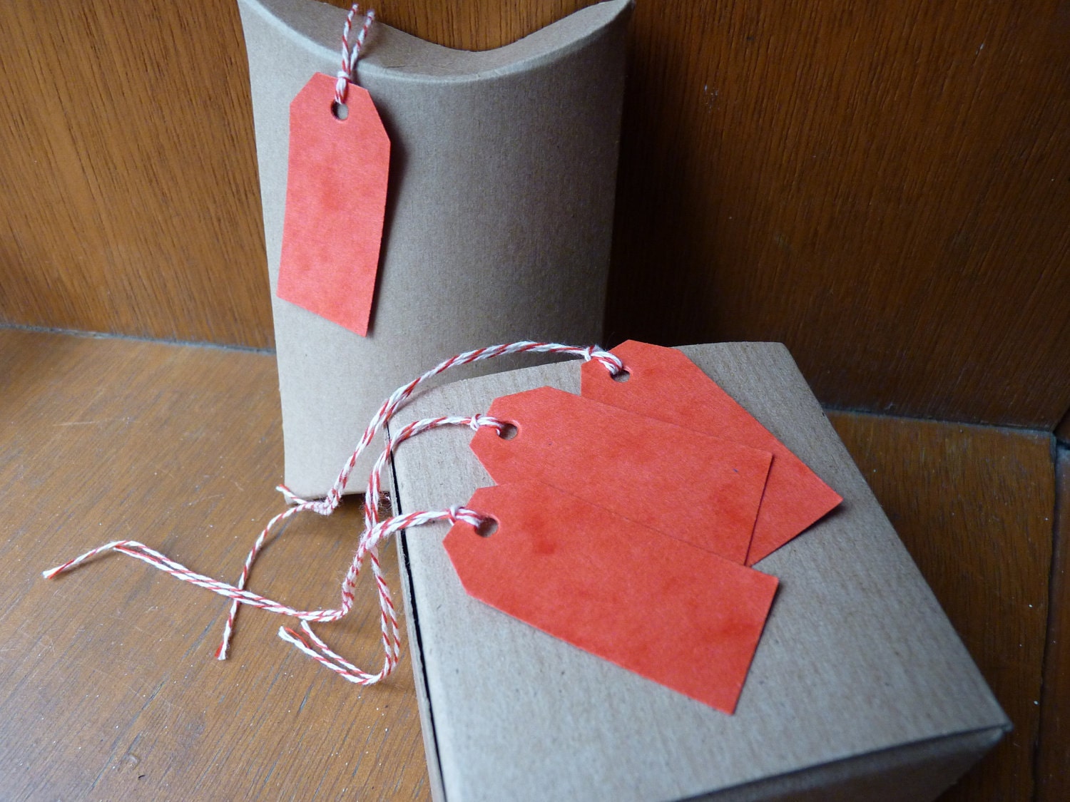 Set of five red hang tags with bakers twine