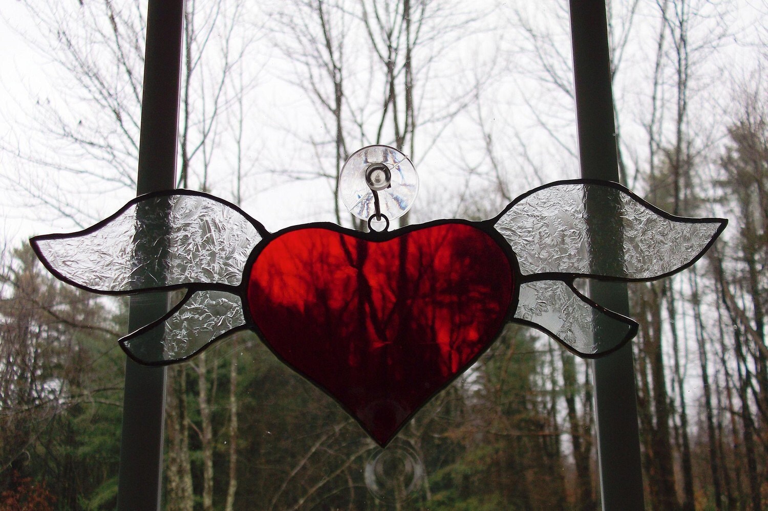 Ah yesa heart with wings