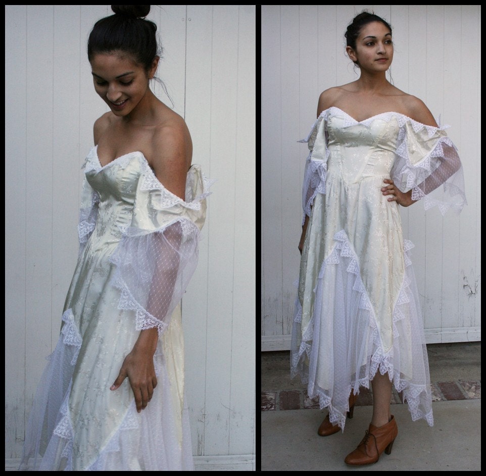 vintage wedding dresses with a light purple sash. vintage wedding dresses with a light purple sash.