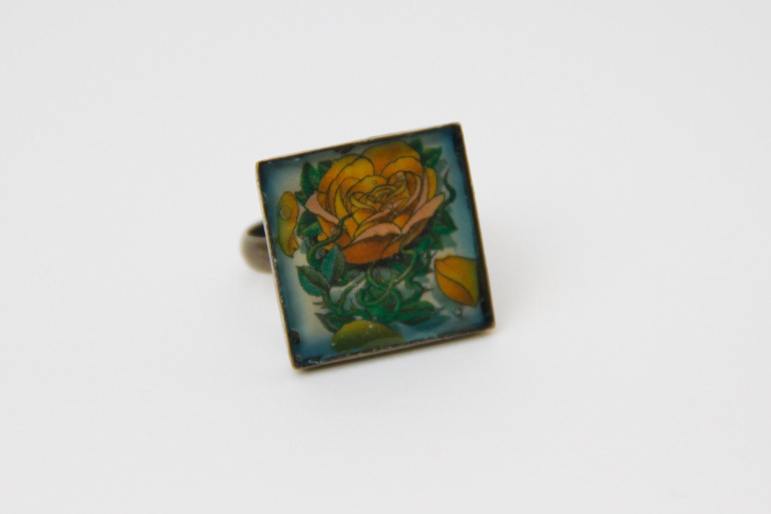 This is a tattooed ring He has a nice old school rose image on it the ring