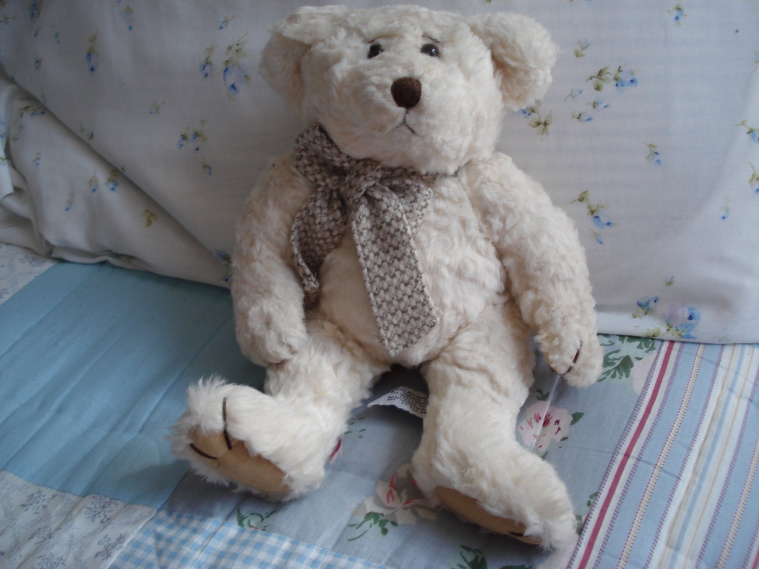 old teddy bear with moving arms and legs