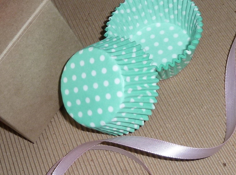You will receive 50 tiffany blue polka dot cupcake papers