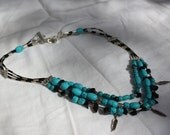 Turquoise Necklace with Black Glass and Metal Feather Accents
