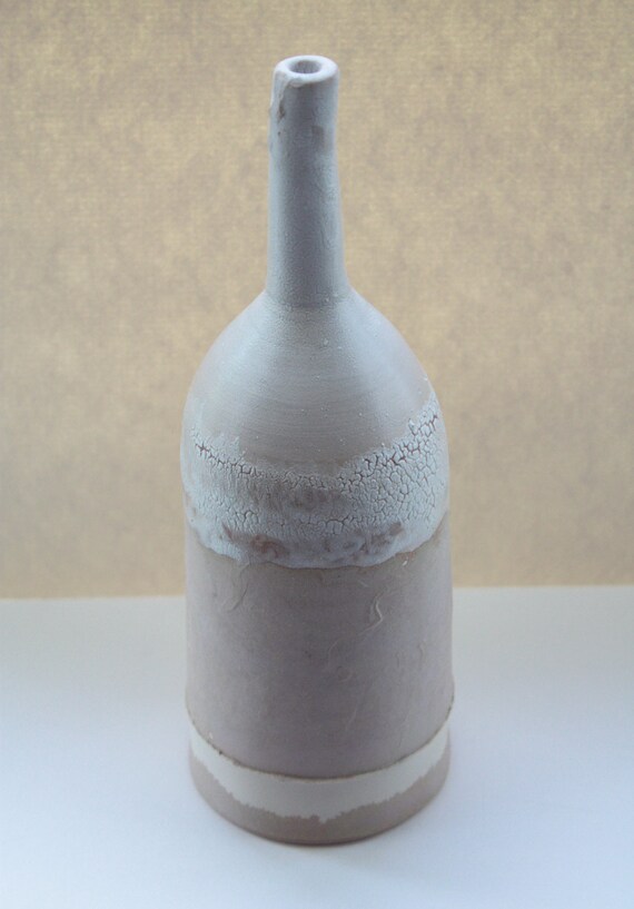 Tall ceramic bottle with unusual pattern handthrown by madebymanos